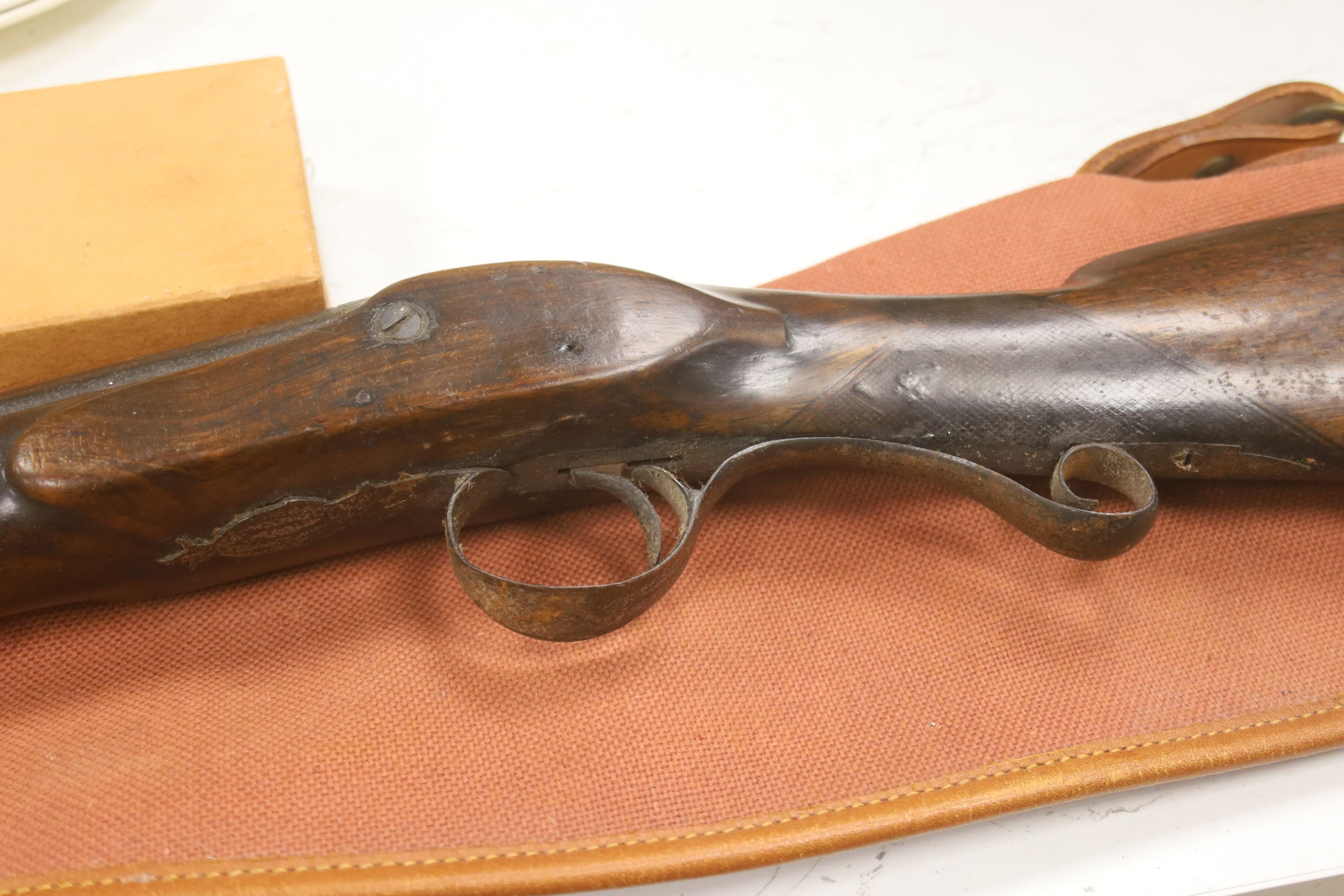 A 19th century percussion rifle, walnut stock, with ram rod, in canvas case, complete with gun cleaning kit
